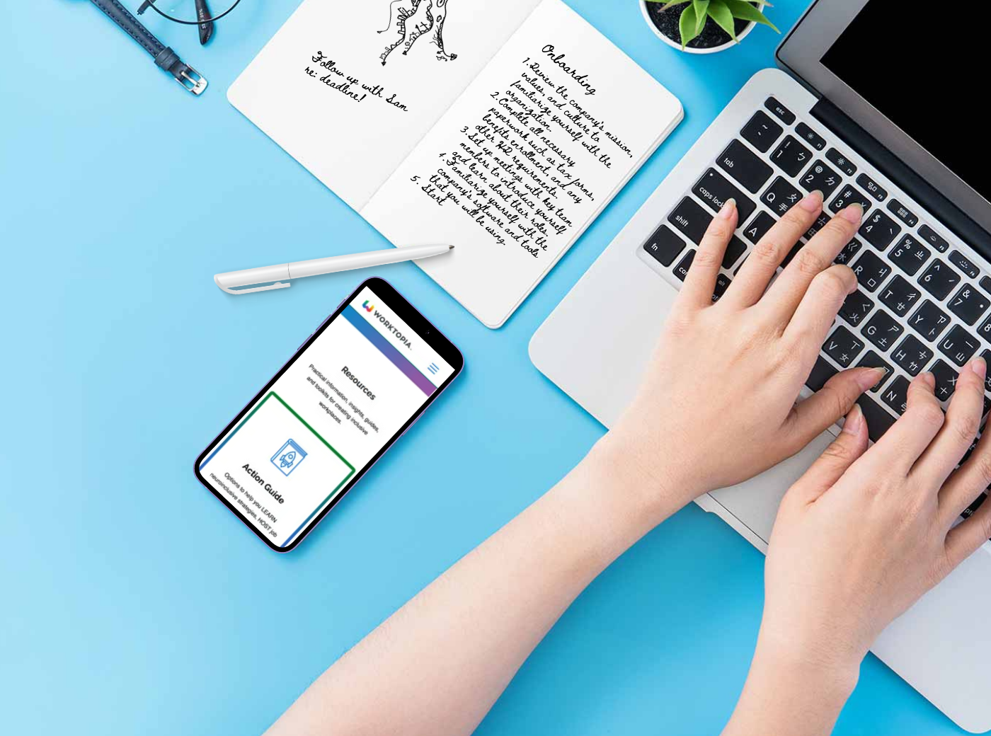 Onboarding-Checklist On a light blue background, there is a hand typing on a laptop keyboard, to the top left-hand side of the picture, there is a notebook with some onboarding text, and to the lower left-hand side of the picture, there is a mobile device showing the Worktopia resources webpage.